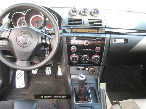 Подключение устройств к автомобильной мультимедийной системе Mazda 3 2008 года